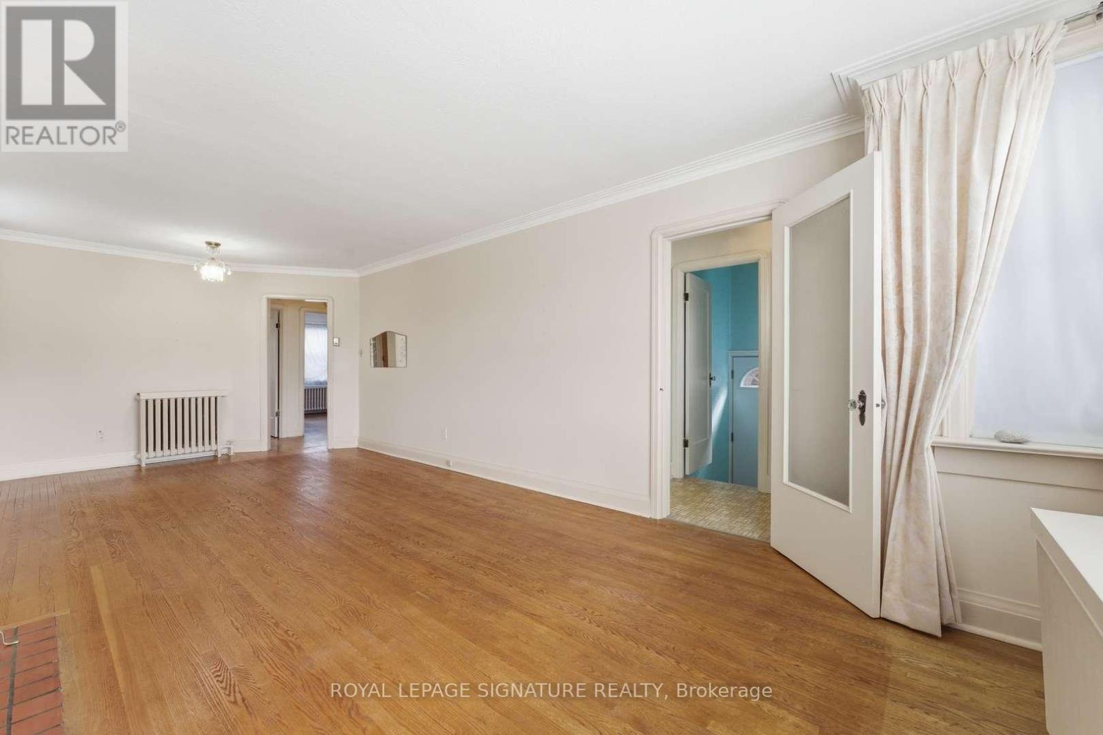 8 Memorial Park Avenue, Toronto, Ontario  M4J 2J6 - Photo 7 - E13048130