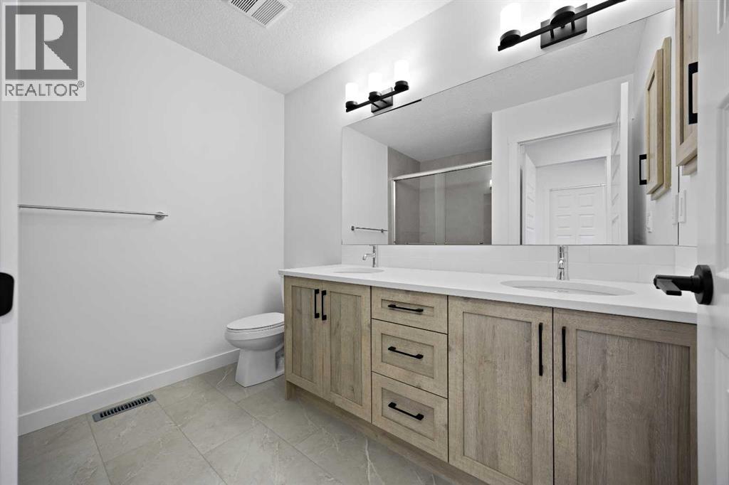 2226 Bayview Drive SW, Airdrie, Alberta  T4B 5N4 - Photo 26 - A2289337