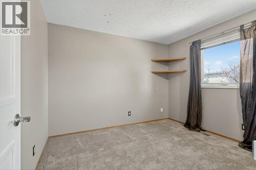29 Shannon Manor Sw, Calgary, Alberta  T2Y 2Y5 - Photo 20 - A2303275