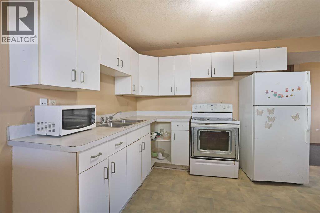 184 Upland Boulevard W, Brooks, Alberta  T1R 0R1 - Photo 30 - A2302379