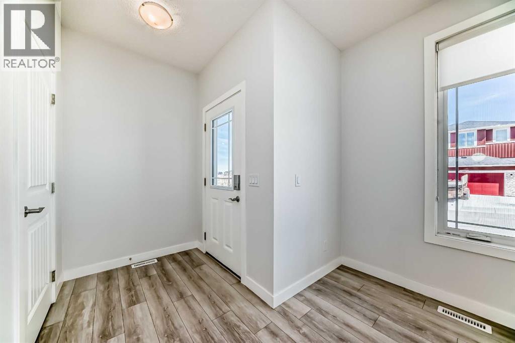 121 Ambleside Heath Nw, Calgary, Alberta  T3P 1S4 - Photo 2 - A2303332