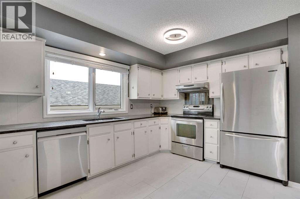 436 Huntley Way Ne, Calgary, Alberta  T2K 4Z8 - Photo 11 - A2305488