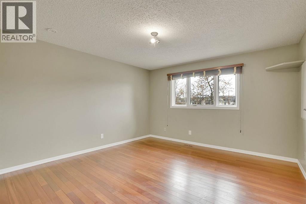 436 Huntley Way Ne, Calgary, Alberta  T2K 4Z8 - Photo 16 - A2305488