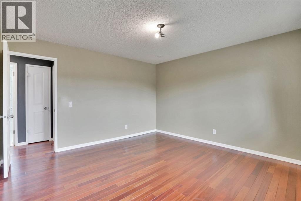 436 Huntley Way Ne, Calgary, Alberta  T2K 4Z8 - Photo 19 - A2305488