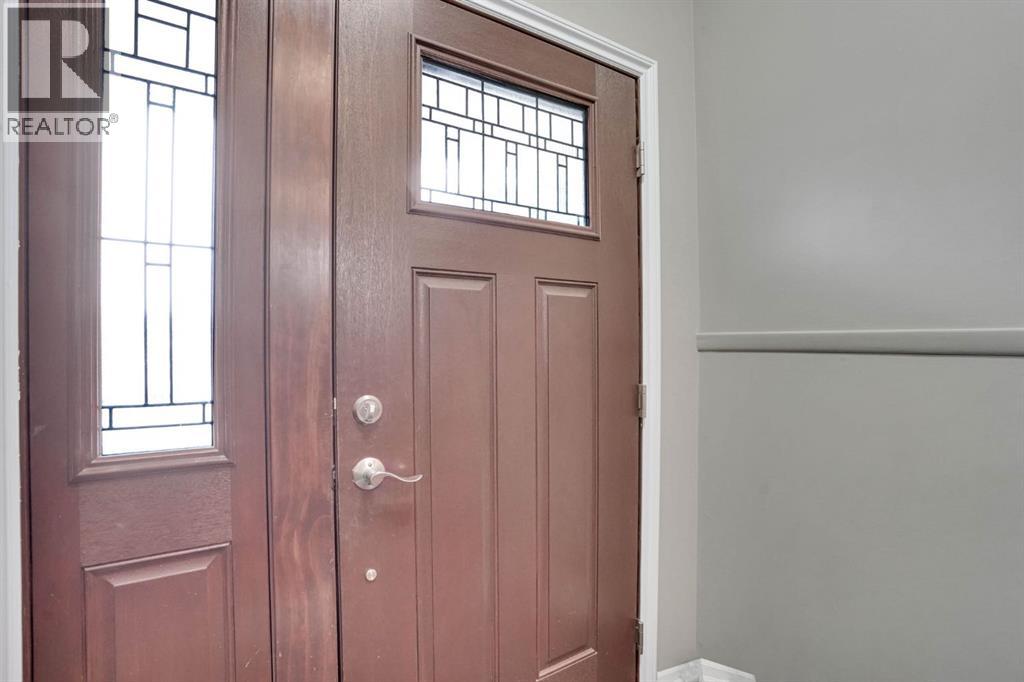 436 Huntley Way Ne, Calgary, Alberta  T2K 4Z8 - Photo 3 - A2305488