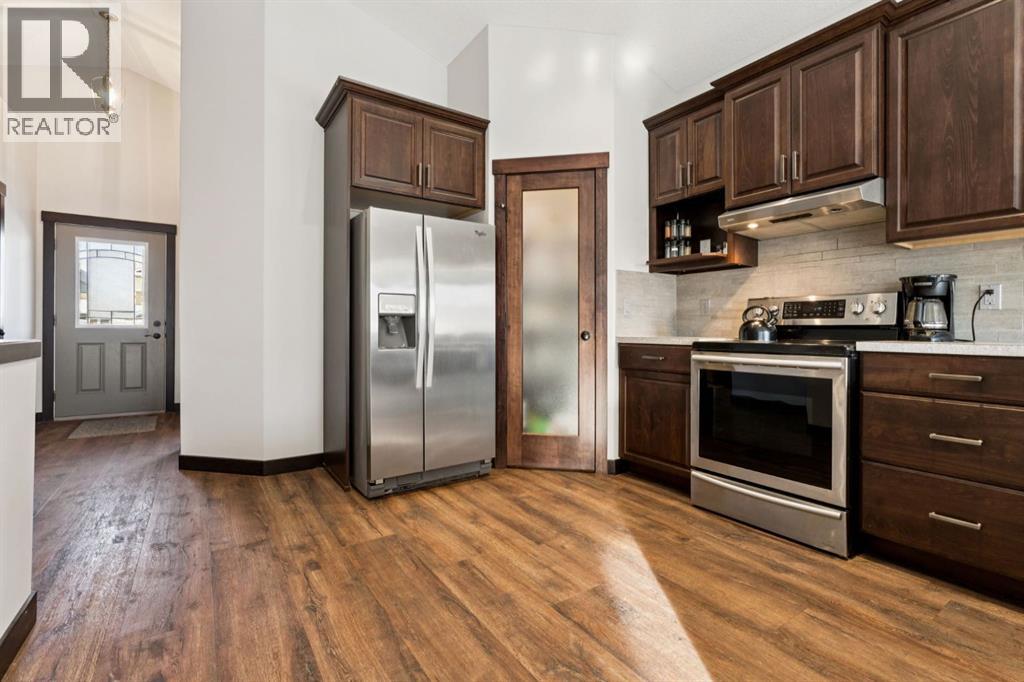 104 Riverwood Way SW, Diamond Valley, Alberta  T0L 0H0 - Photo 6 - A2292313