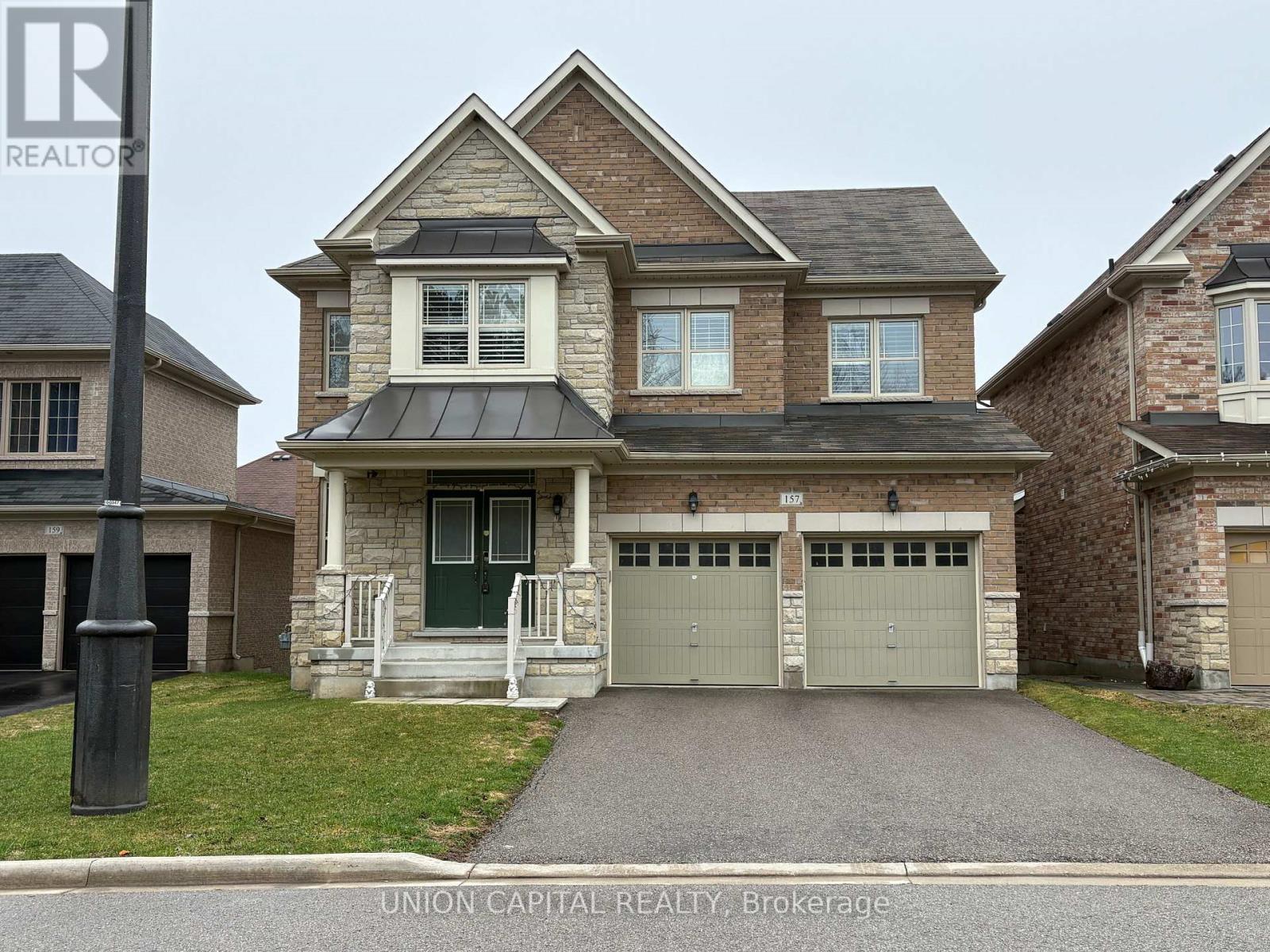 157 RIDING MOUNTAIN DRIVE, Richmond Hill, Ontario