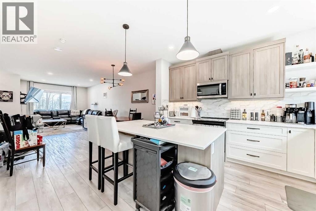 223 Wolf Creek Avenue SE, Calgary, Alberta  T2X 4X1 - Photo 8 - A2300562