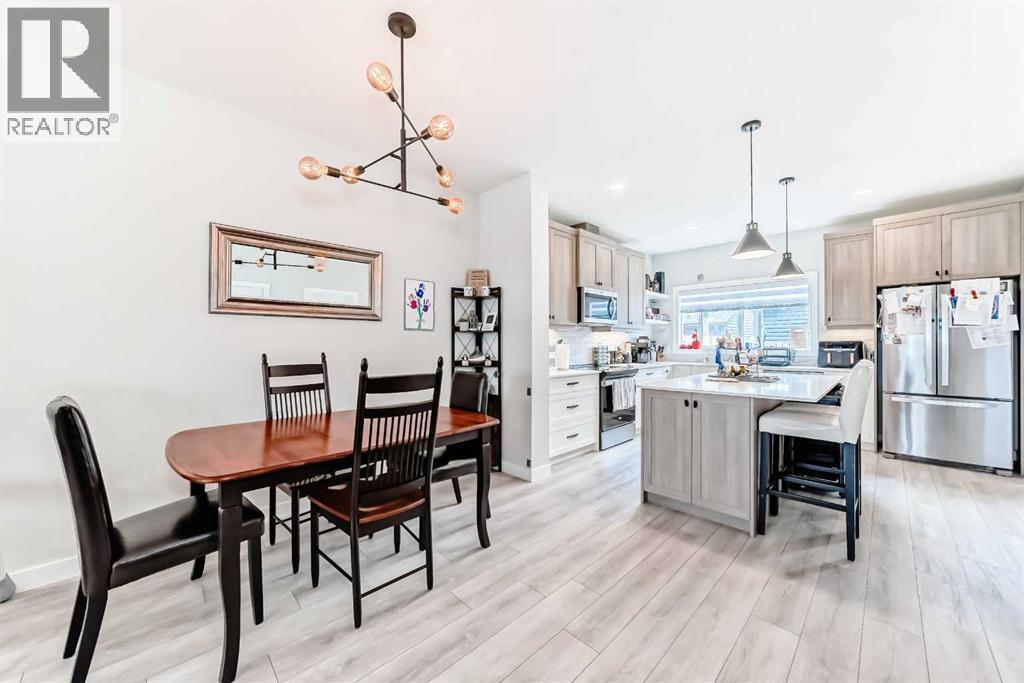 223 Wolf Creek Avenue SE, Calgary, Alberta  T2X 4X1 - Photo 9 - A2300562