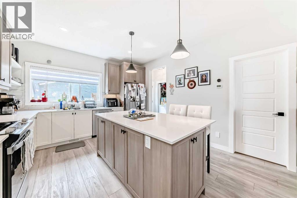 223 Wolf Creek Avenue SE, Calgary, Alberta  T2X 4X1 - Photo 5 - A2300562