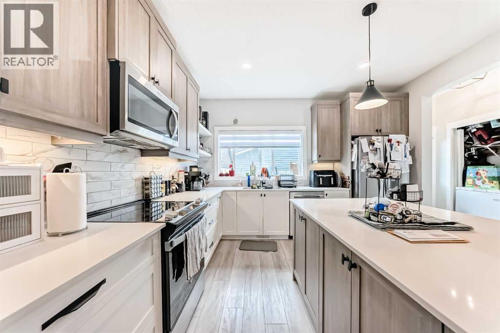 223 Wolf Creek Avenue SE, Calgary, Alberta  T2X 4X1 - Photo 4 - A2300562