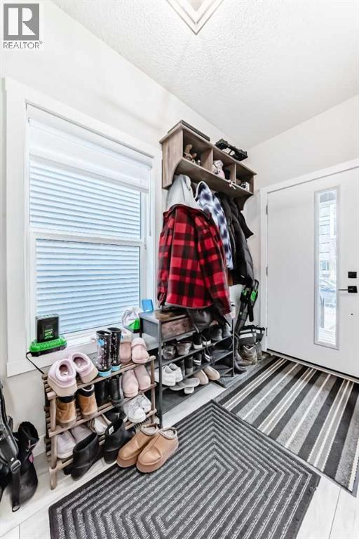 223 Wolf Creek Avenue SE, Calgary, Alberta  T2X 4X1 - Photo 3 - A2300562