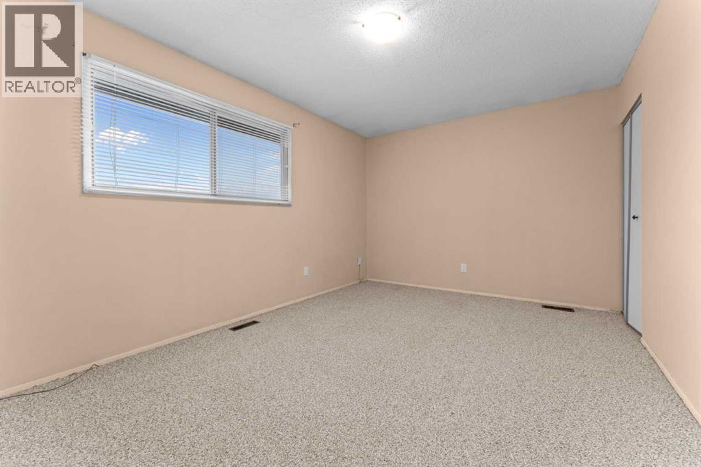 1202, 2200 Woodview Drive Sw, Calgary, Alberta  T2W 3N6 - Photo 5 - A2305307