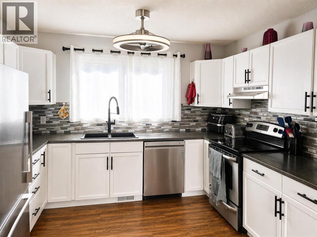 2452 Riverstone Road SE, Calgary, Alberta  T2C 4J8 - Photo 7 - A2303494