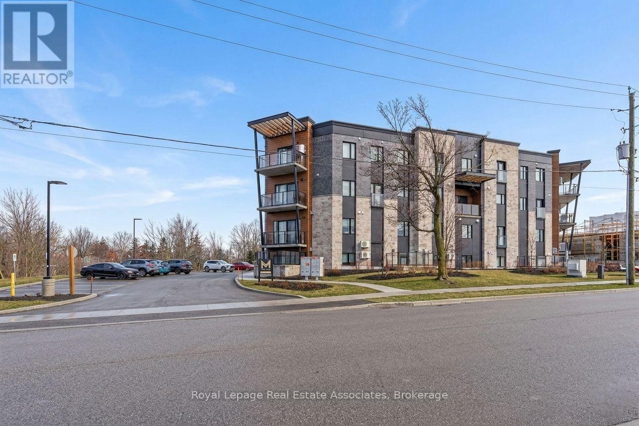 102 - 17 Centre Street, Orangeville, Ontario  L9W 7S6 - Photo 2 - W12699928