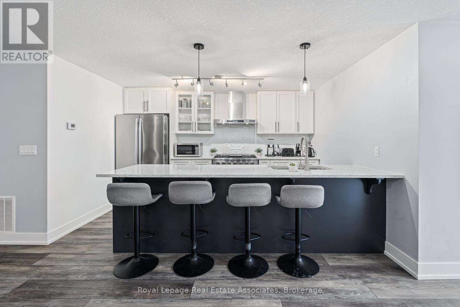 102 - 17 Centre Street, Orangeville, Ontario  L9W 7S6 - Photo 7 - W12699928