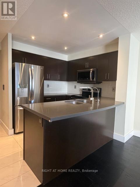 1002 - 3 Michael Power Place, Toronto, Ontario  M9A 0A2 - Photo 2 - W13049500