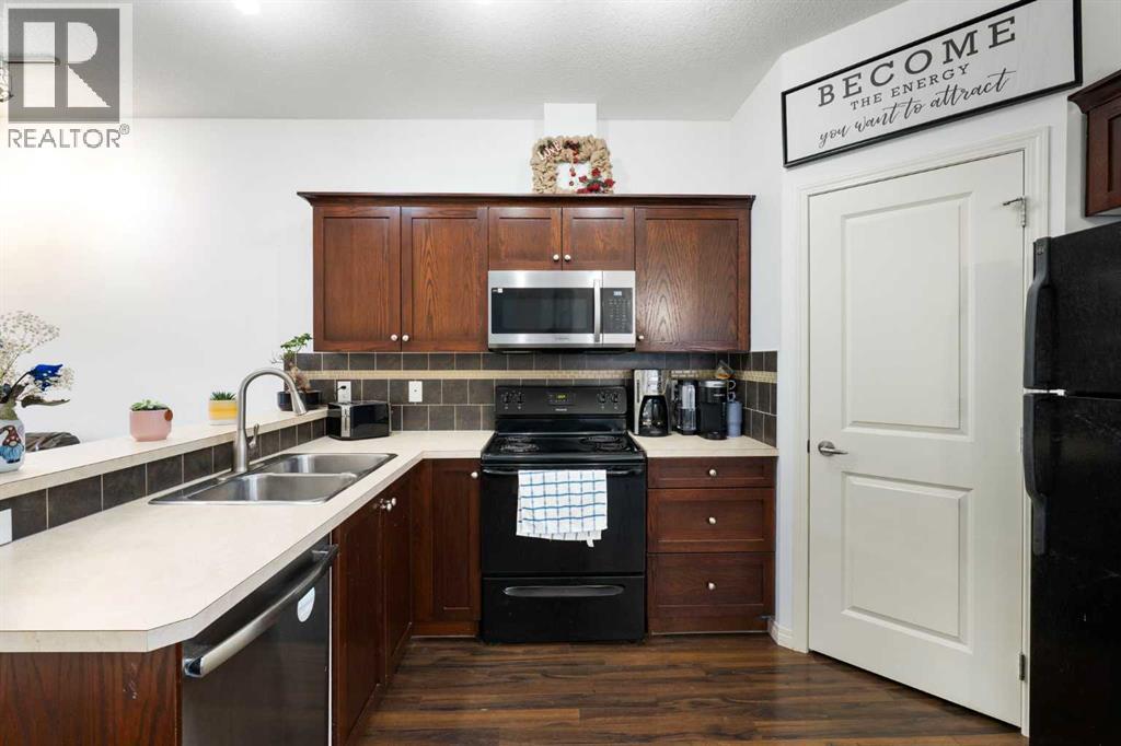 202, 1001 8 Street Nw, Airdrie, Alberta  T4B 0W2 - Photo 11 - A2302359