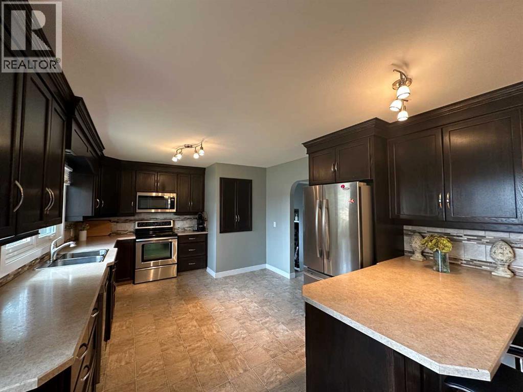 5002 57 Avenue, Ponoka, Alberta  T4J 1G5 - Photo 4 - A2304224