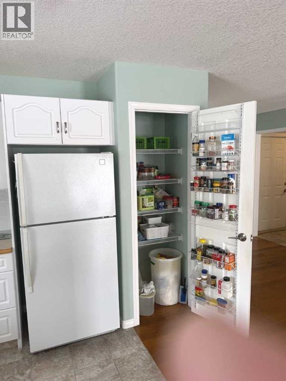 218 Centre Avenue W, Airdrie, Alberta  T4B 2M6 - Photo 10 - A2305162