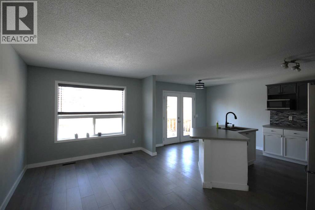 309 Bridleridge Way Sw, Calgary, Alberta  T2Y 4M5 - Photo 10 - A2303250