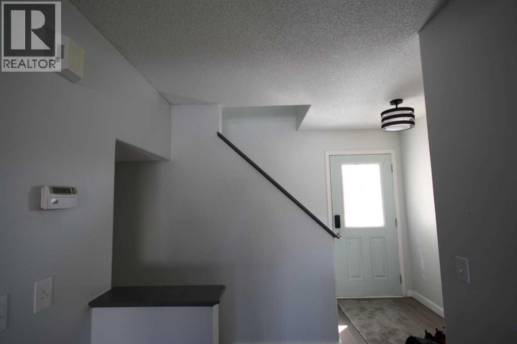 309 Bridleridge Way Sw, Calgary, Alberta  T2Y 4M5 - Photo 6 - A2303250