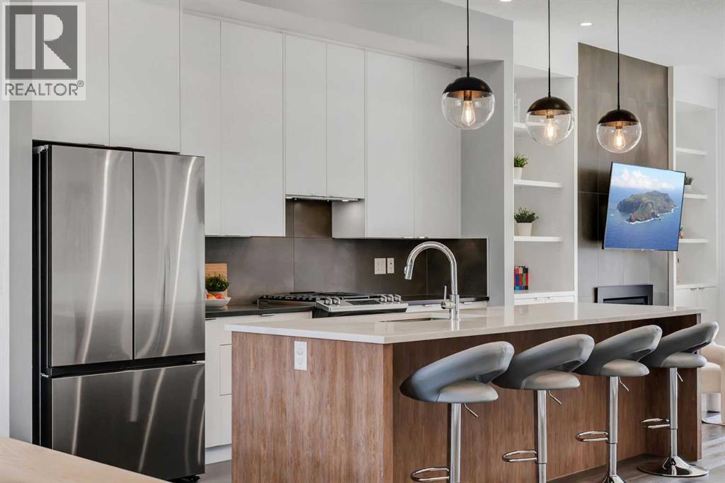 947 31 Avenue Nw, Calgary, Alberta  T2K 0A6 - Photo 3 - A2304183