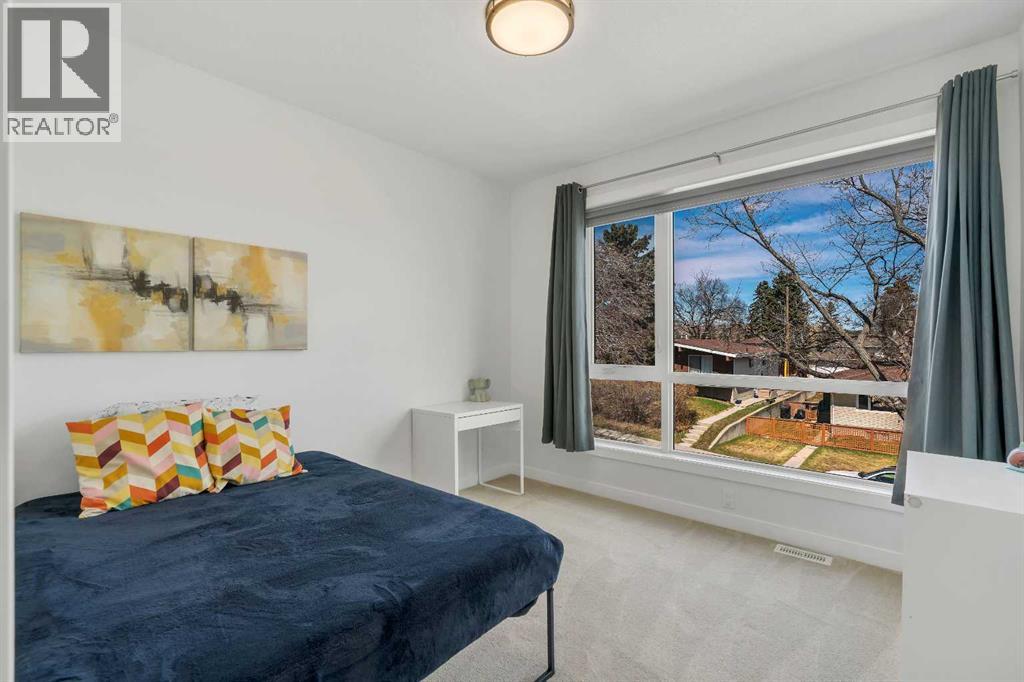 947 31 Avenue Nw, Calgary, Alberta  T2K 0A6 - Photo 20 - A2304183