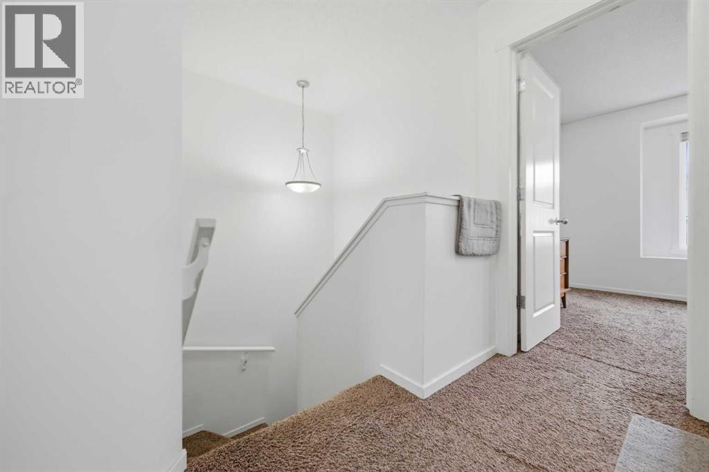 98 Panatella Hill Nw, Calgary, Alberta  T3K 0B6 - Photo 16 - A2301521