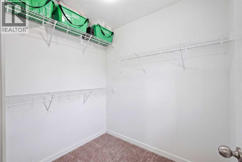 98 Panatella Hill Nw, Calgary, Alberta  T3K 0B6 - Photo 20 - A2301521