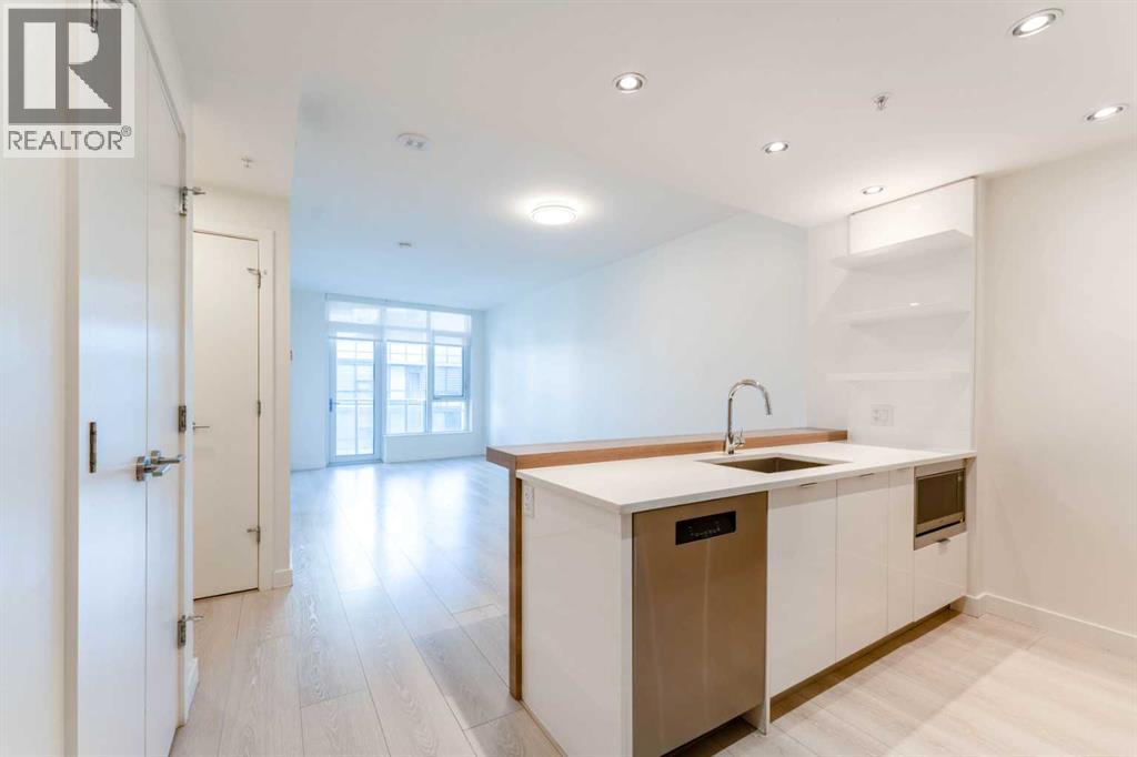 401, 138 Waterfront Court Sw, Calgary, Alberta  T2P 1L1 - Photo 6 - A2299050