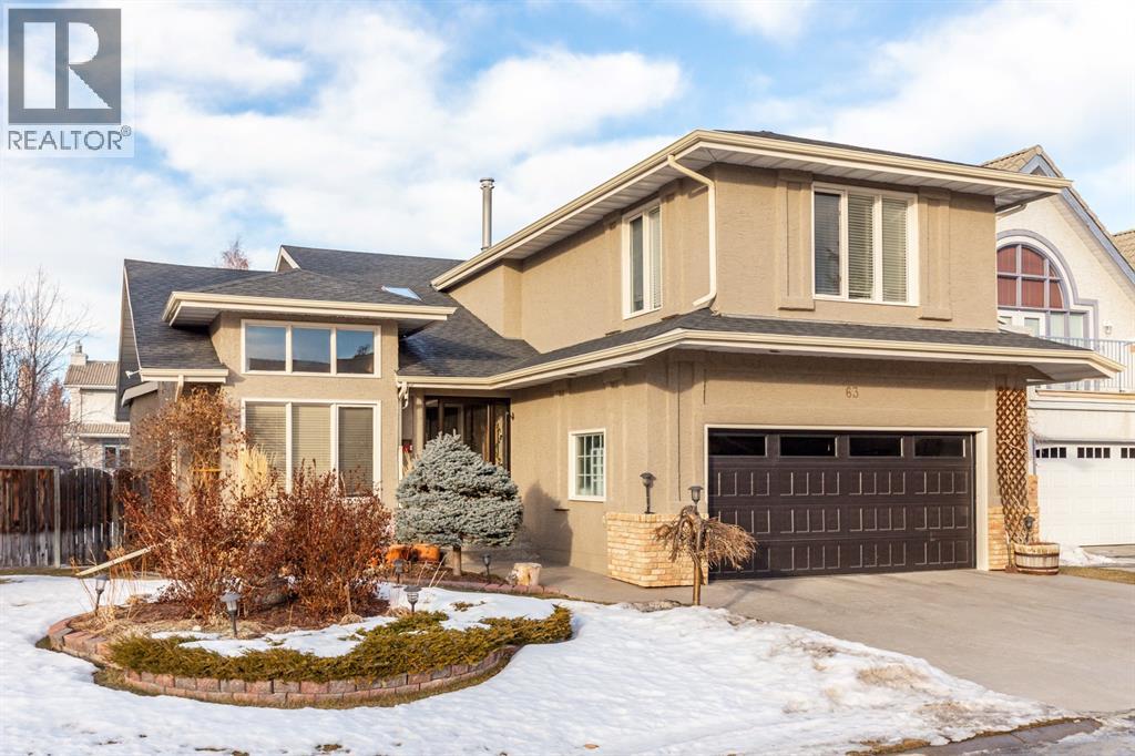 63 Edgeridge Court NW, Calgary, Alberta  T3A 6K5 - Photo 2 - A2283316