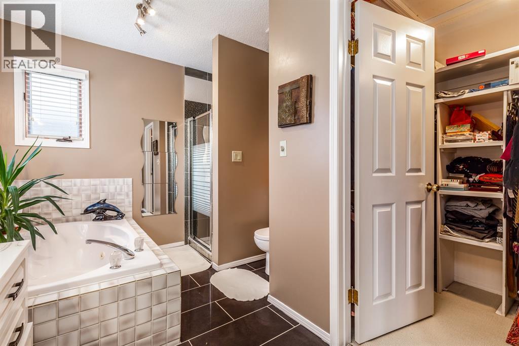 63 Edgeridge Court NW, Calgary, Alberta  T3A 6K5 - Photo 25 - A2283316