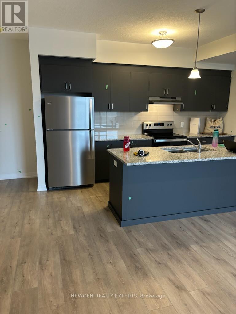 E018 - 261 WOODBINE AVE AVENUE, Kitchener, Ontario