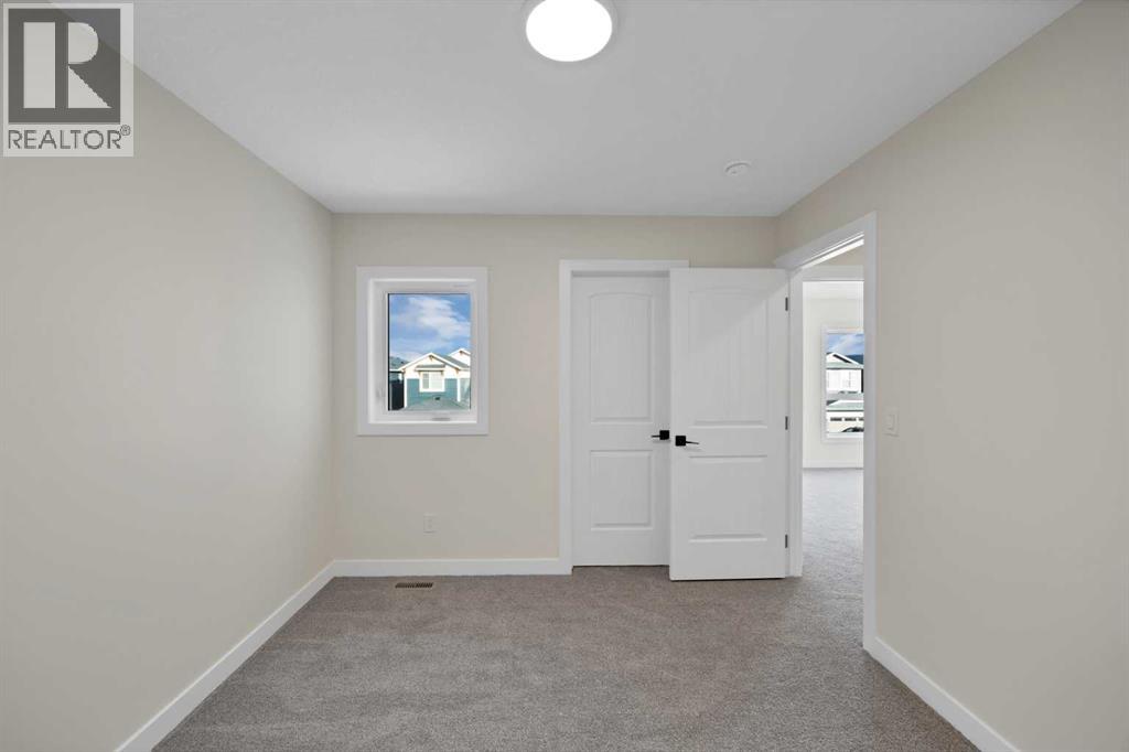191 Homestead Common Ne, Calgary, Alberta  T3J 5V7 - Photo 31 - A2298685