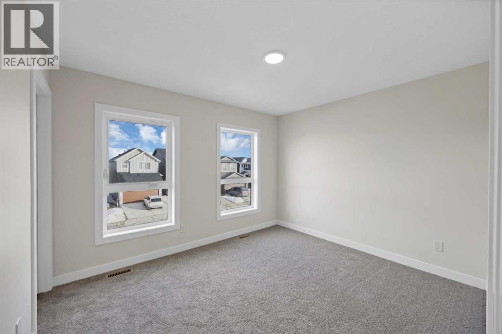191 Homestead Common Ne, Calgary, Alberta  T3J 5V7 - Photo 33 - A2298685