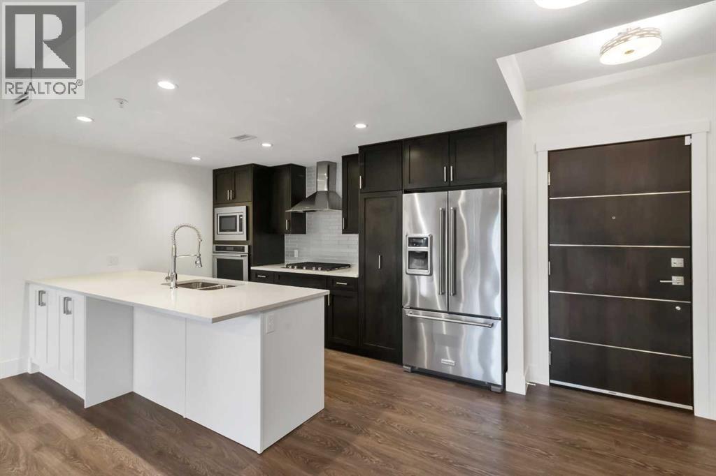 106, 3320 3 Avenue NW, Calgary, Alberta  T2N 0L9 - Photo 5 - A2301239