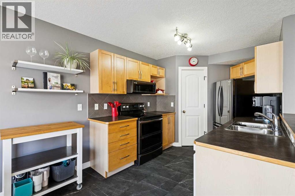 30 Bridlecrest Road Sw, Calgary, Alberta  T2Y 5J2 - Photo 12 - A2303074