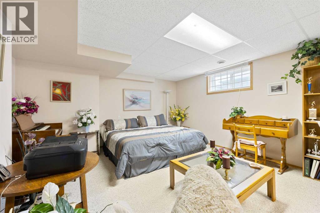 217 Arbour Cliff Close Nw, Calgary, Alberta  T3G 3W7 - Photo 26 - A2244003