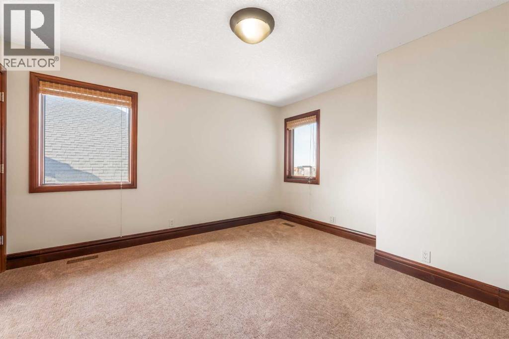 8 Coulee Park SW, Calgary, Alberta  T3H 5J5 - Photo 39 - A2299481
