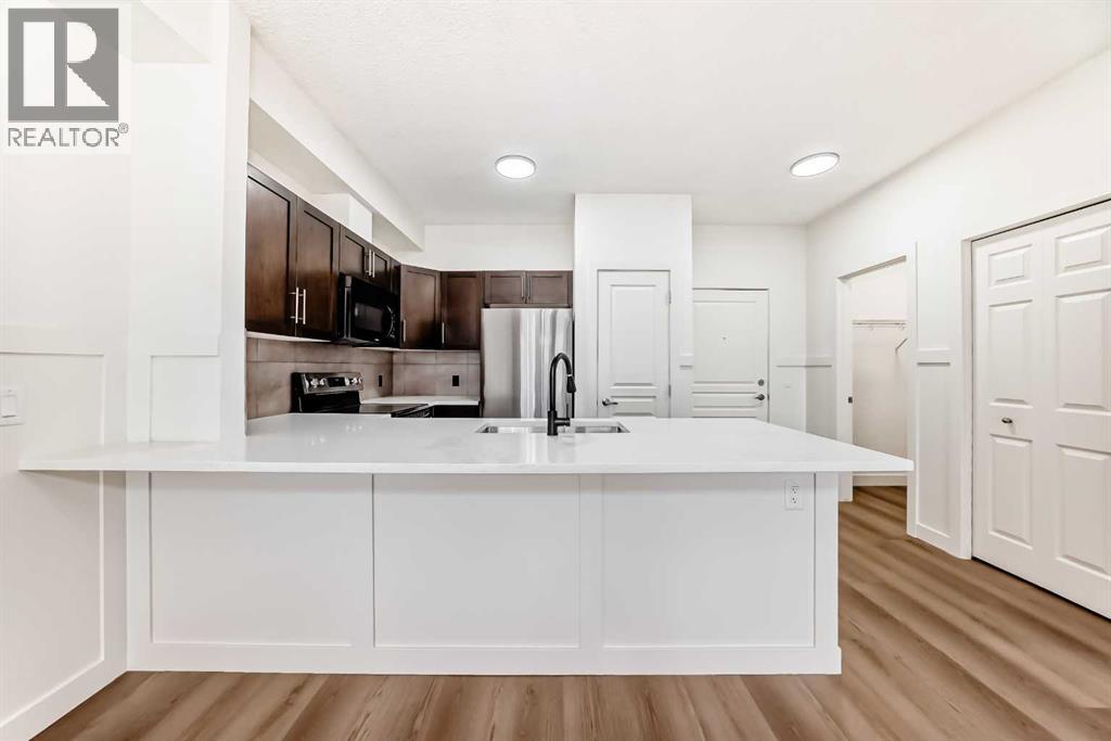 101, 22 Panatella Road NW, Calgary, Alberta  T3K 0V4 - Photo 5 - A2290846