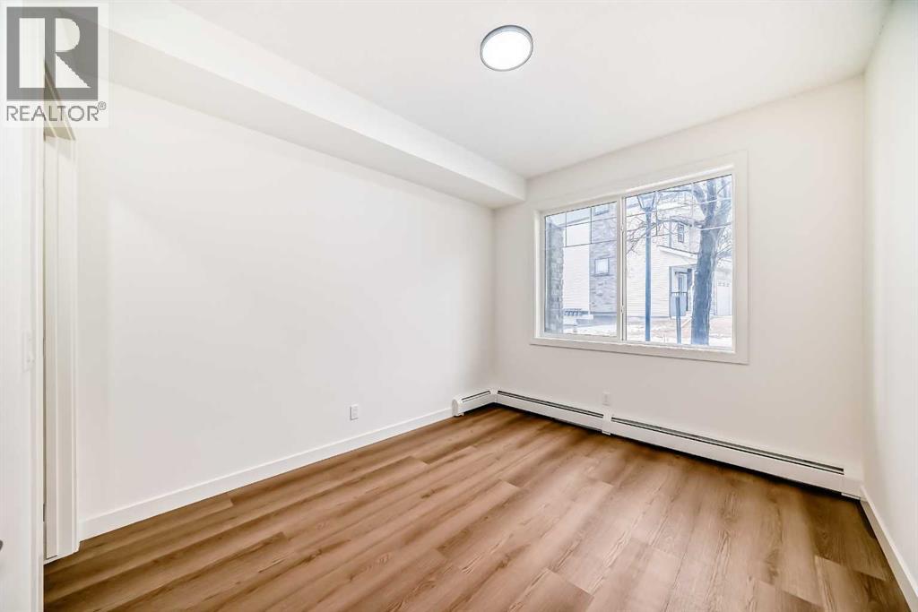 101, 22 Panatella Road NW, Calgary, Alberta  T3K 0V4 - Photo 11 - A2290846