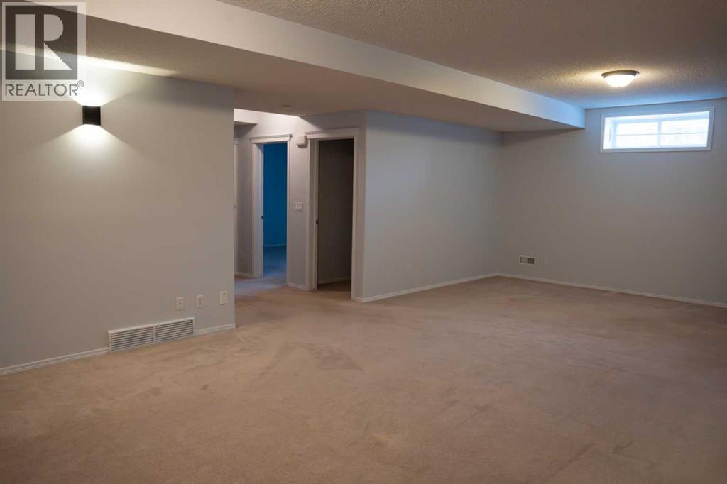 3 Strathridge Bay Sw, Calgary, Alberta  T3H 4S1 - Photo 8 - A2303312