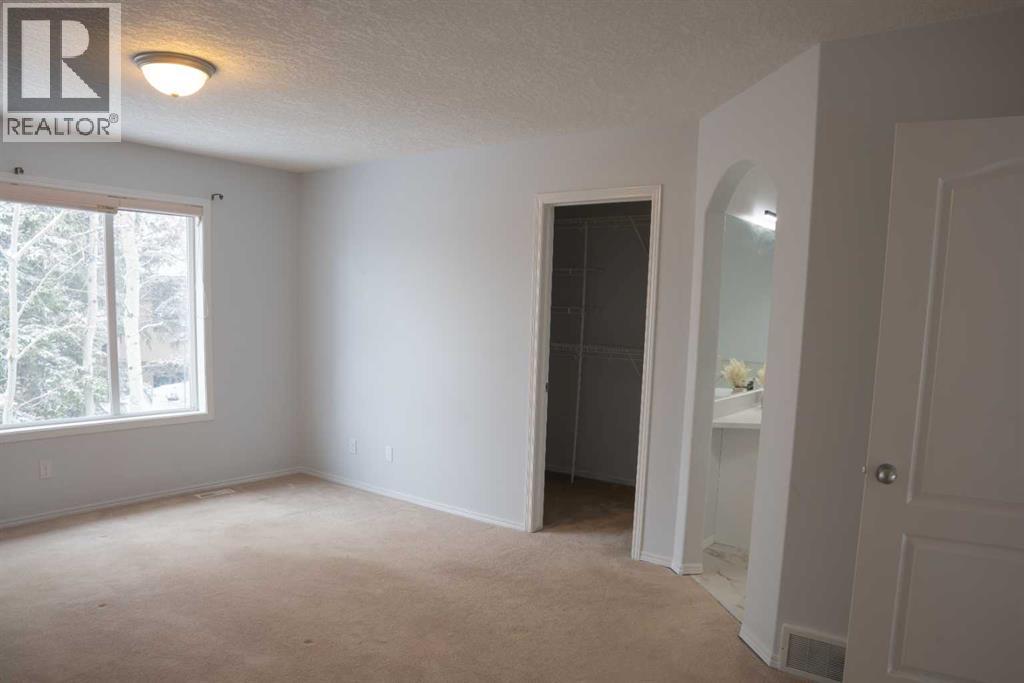 3 Strathridge Bay Sw, Calgary, Alberta  T3H 4S1 - Photo 10 - A2303312