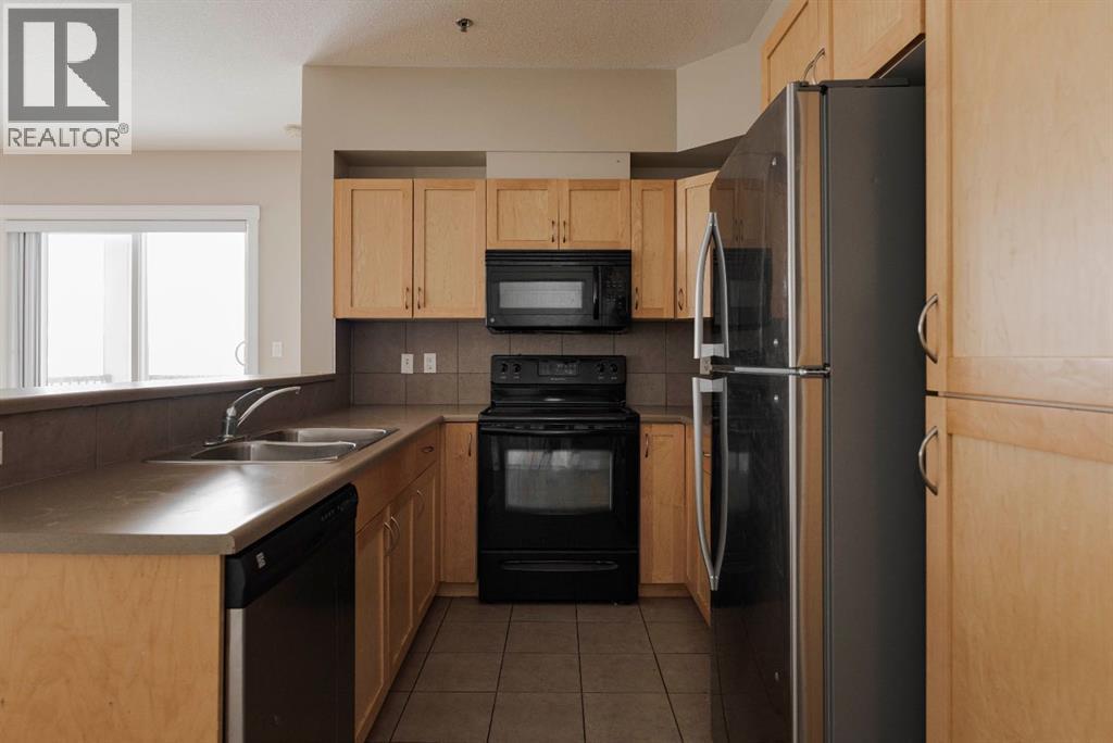 204, 100 Denholm Gate, Fort Mcmurray, Alberta  T9H 0B2 - Photo 7 - A2305579