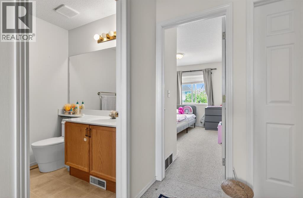 121 Rocky Ridge Court NW, Calgary, Alberta  T3G 4S7 - Photo 19 - A2302580