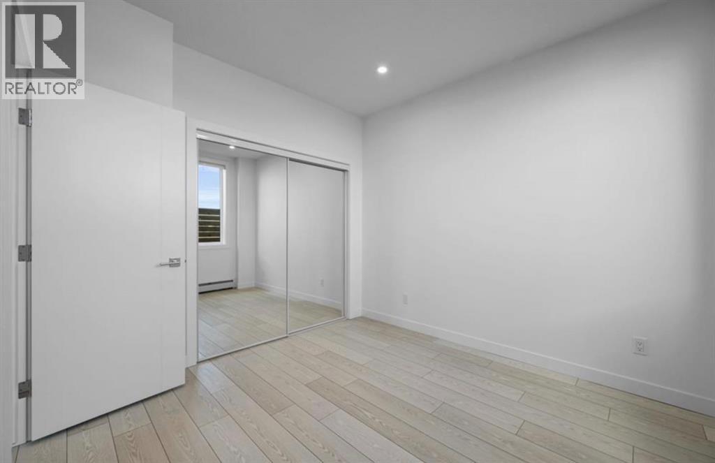 102, 8370 Broadcast Avenue Sw, Calgary, Alberta  T3H 6L3 - Photo 11 - A2281558