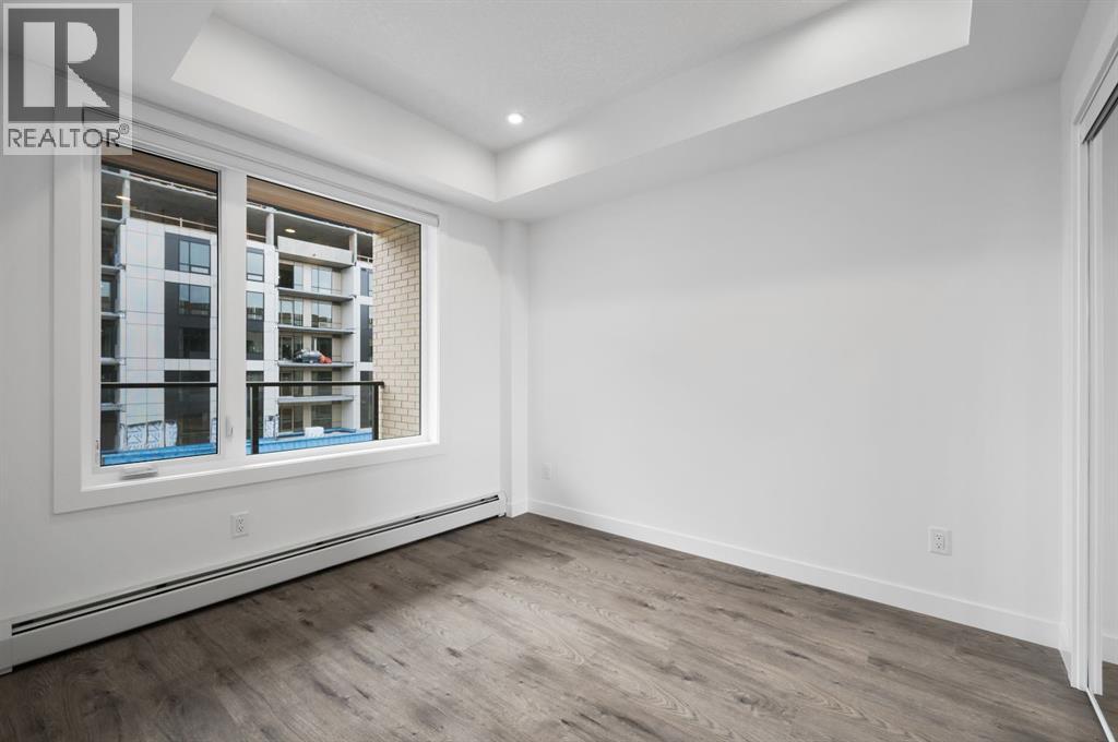 202, 8370 Broadcast Avenue SW, Calgary, Alberta  T3H 6L3 - Photo 11 - A2281559