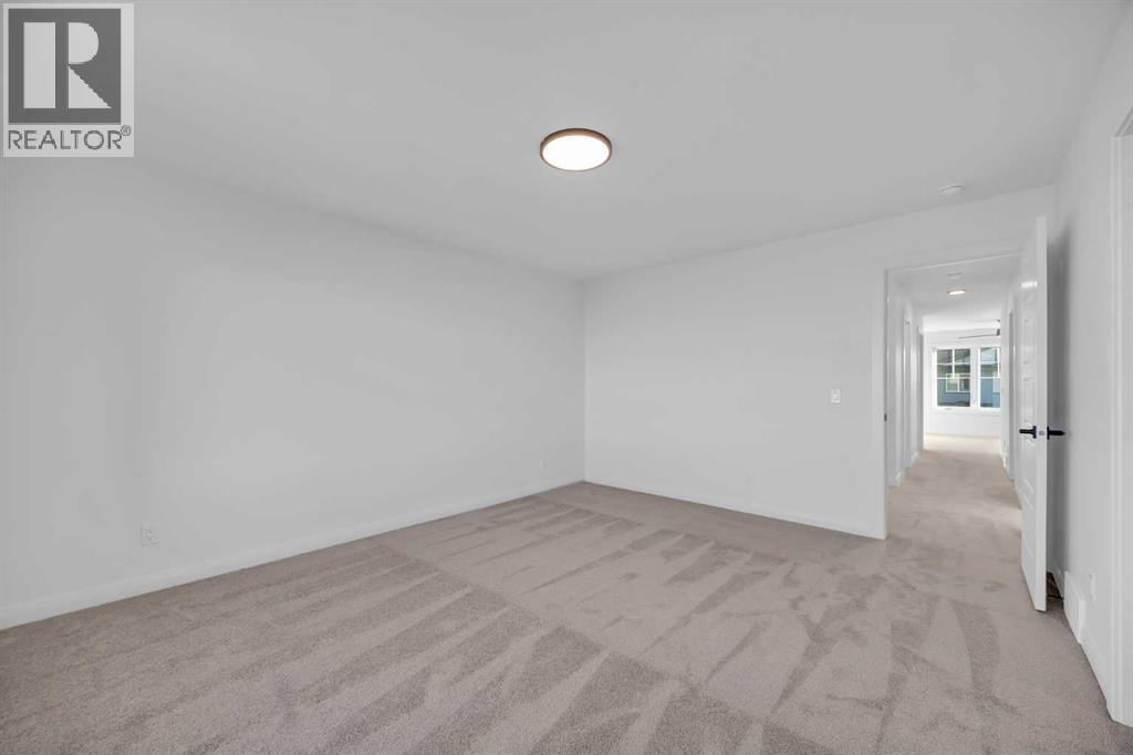 154 Northern Lights Crescent, Langdon, Alberta  T0J 1X2 - Photo 25 - A2290853