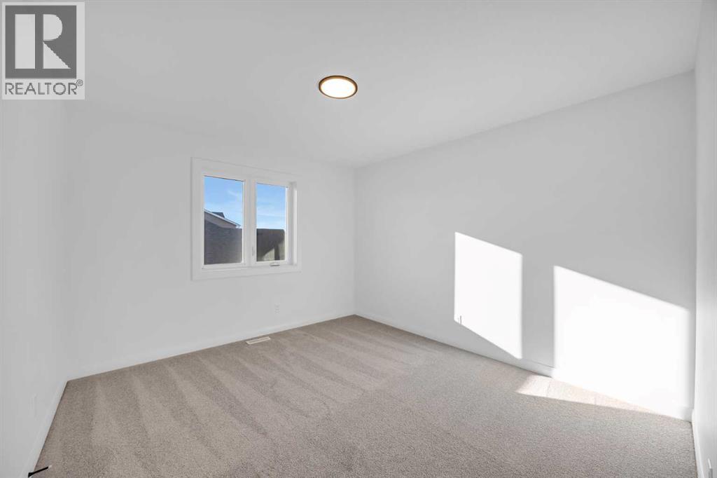 154 Northern Lights Crescent, Langdon, Alberta  T0J 1X2 - Photo 33 - A2290853